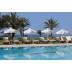Hotel athena royal beach Pafos Kipar letovanje paket aranžman cena smeštaj bazen ležaljke suncobrani