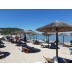 Hotel Nasos Moraitika Krit letovanje Grčka ostrva suncobrani ležaljke plaža
